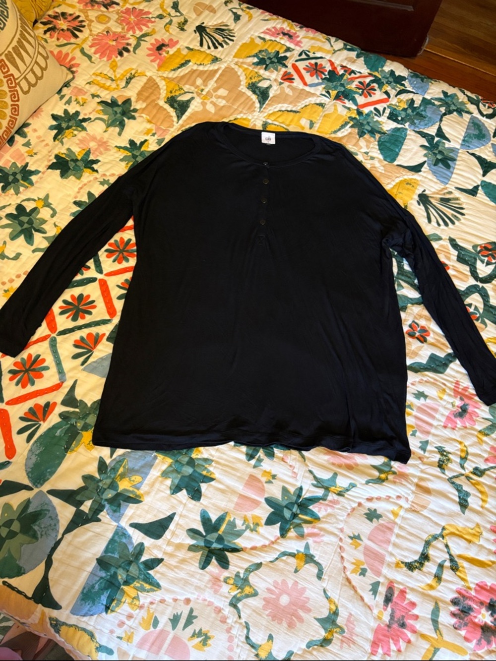 CAbi Black Tunic with button placket and long sleeves.